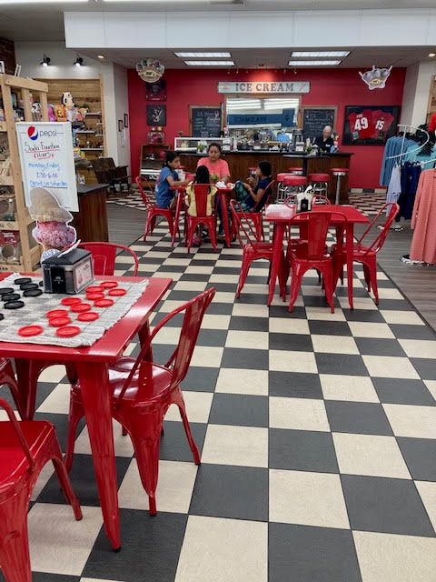 The Soda Fountain seating and counter inside Center Drugs