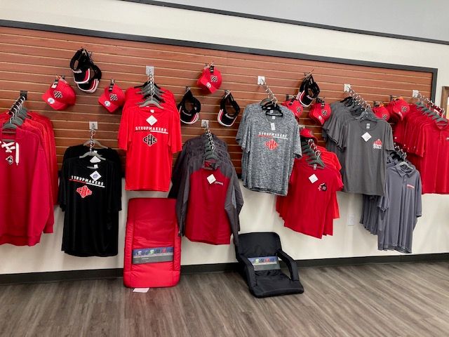 Syrupmaker shirts and apparel displayed at Syrup City Sports